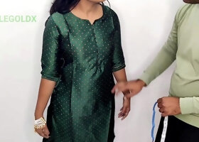 Tailor measures client for custom dress