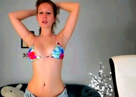 Busty redhead babe strips and masturbates